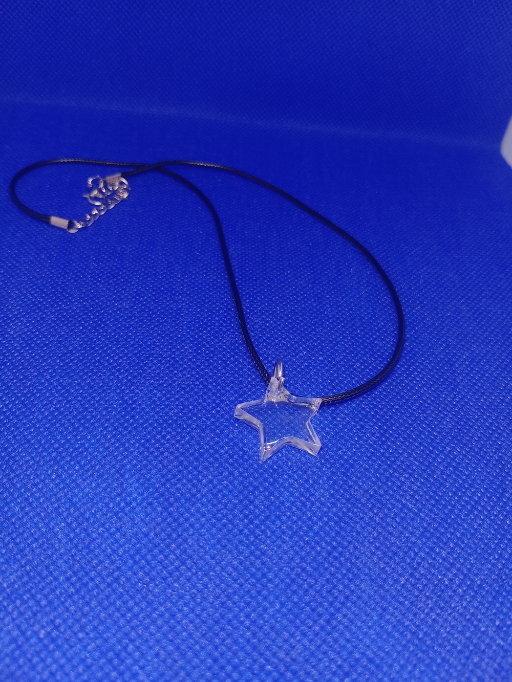 Clear Star Pendant Necklace on Black Cord